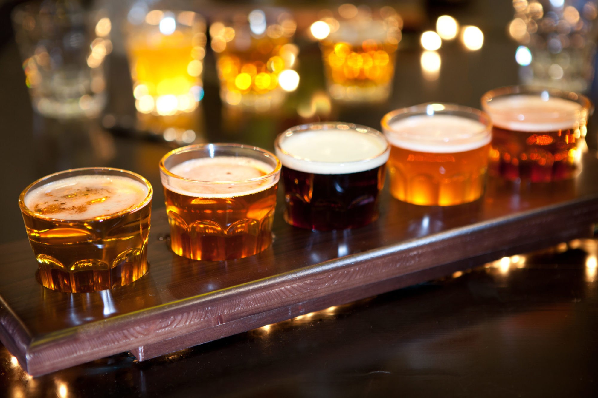 Set of glasses of different light and dark beer